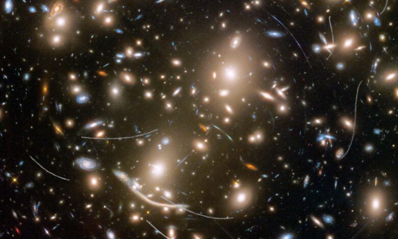 Abell 370 is a distant collection of several hundred galaxies