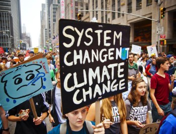 system change not climate change protest