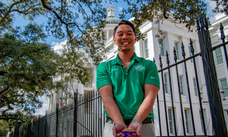 David Dai stands outside Barton Academy in Mobile. Credit: Lee Hedgepeth/Inside Climate News